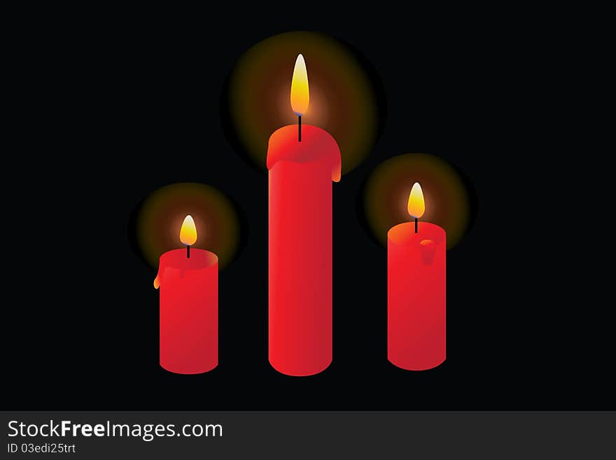 Red candles burning in a dark, black background.