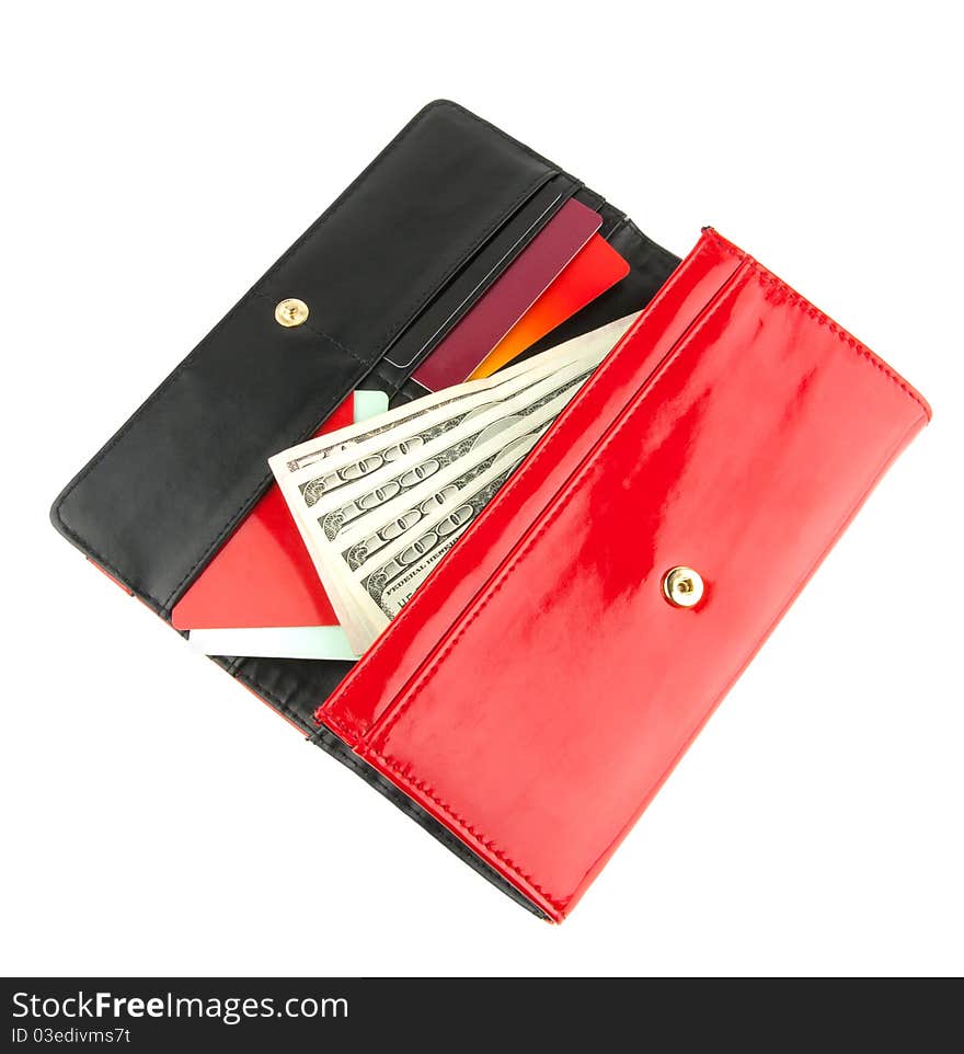 Open red leather clutch with money and credit cards isolated on white background. Open red leather clutch with money and credit cards isolated on white background.