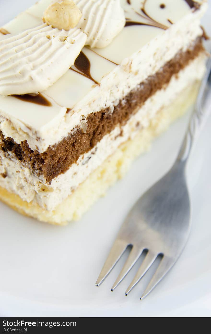 Nougat cake with fork , image from above. Nougat cake with fork , image from above