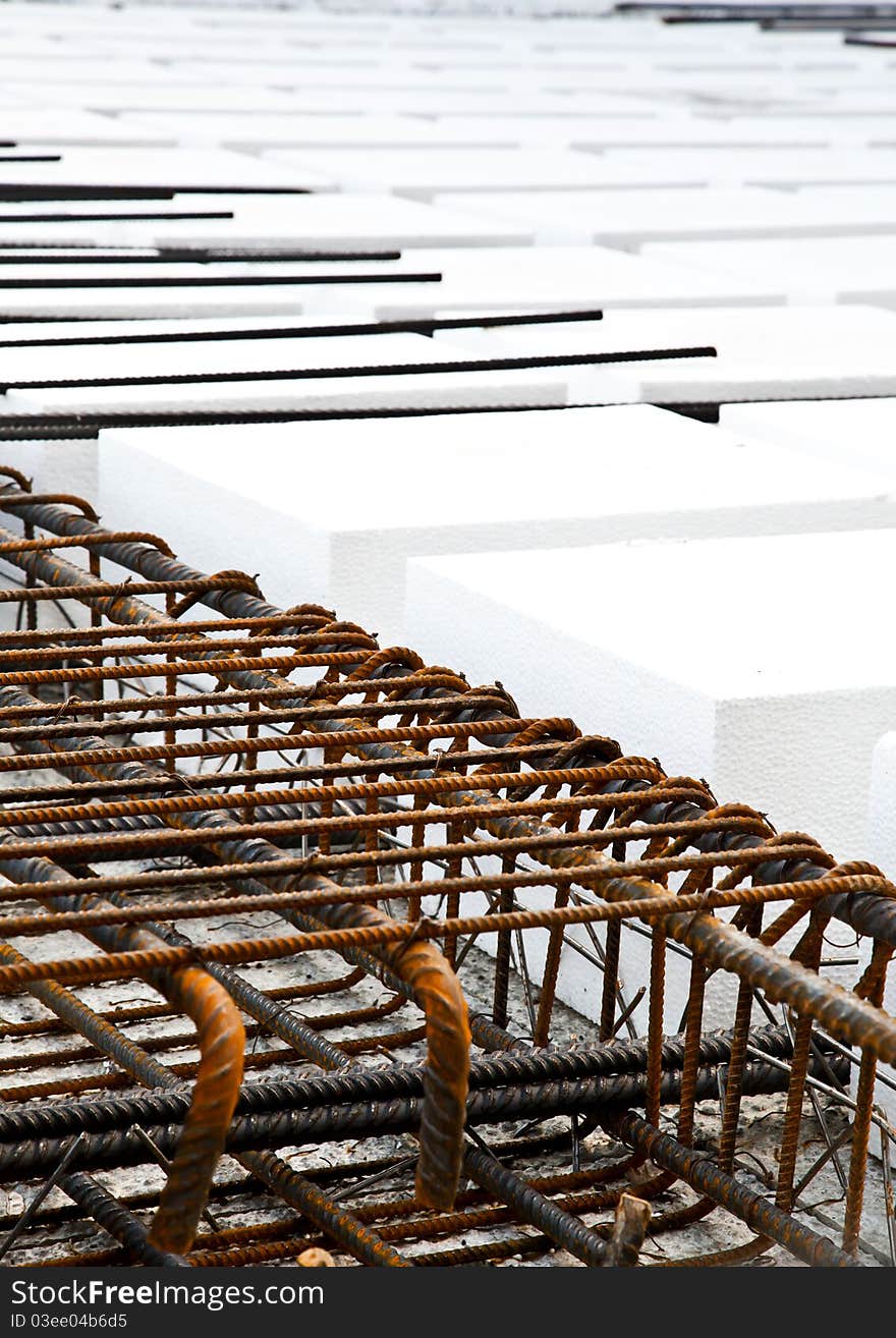 Technical detail of building operations: floor. Materials: polystyrene, steel bars, concrete. Technical detail of building operations: floor. Materials: polystyrene, steel bars, concrete