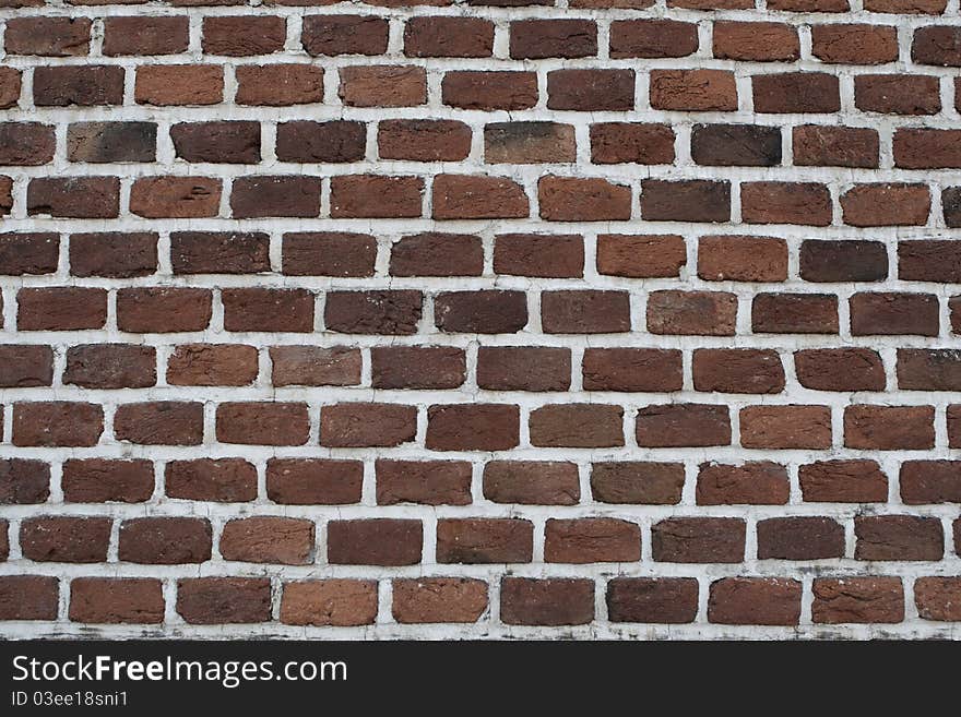 View on the facade of the old brick wall, Prague.