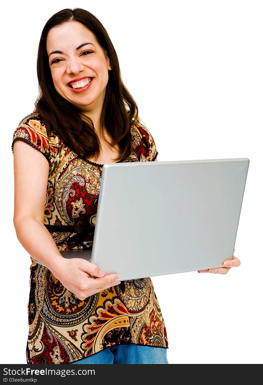 Woman using a laptop and smiling isolated over white