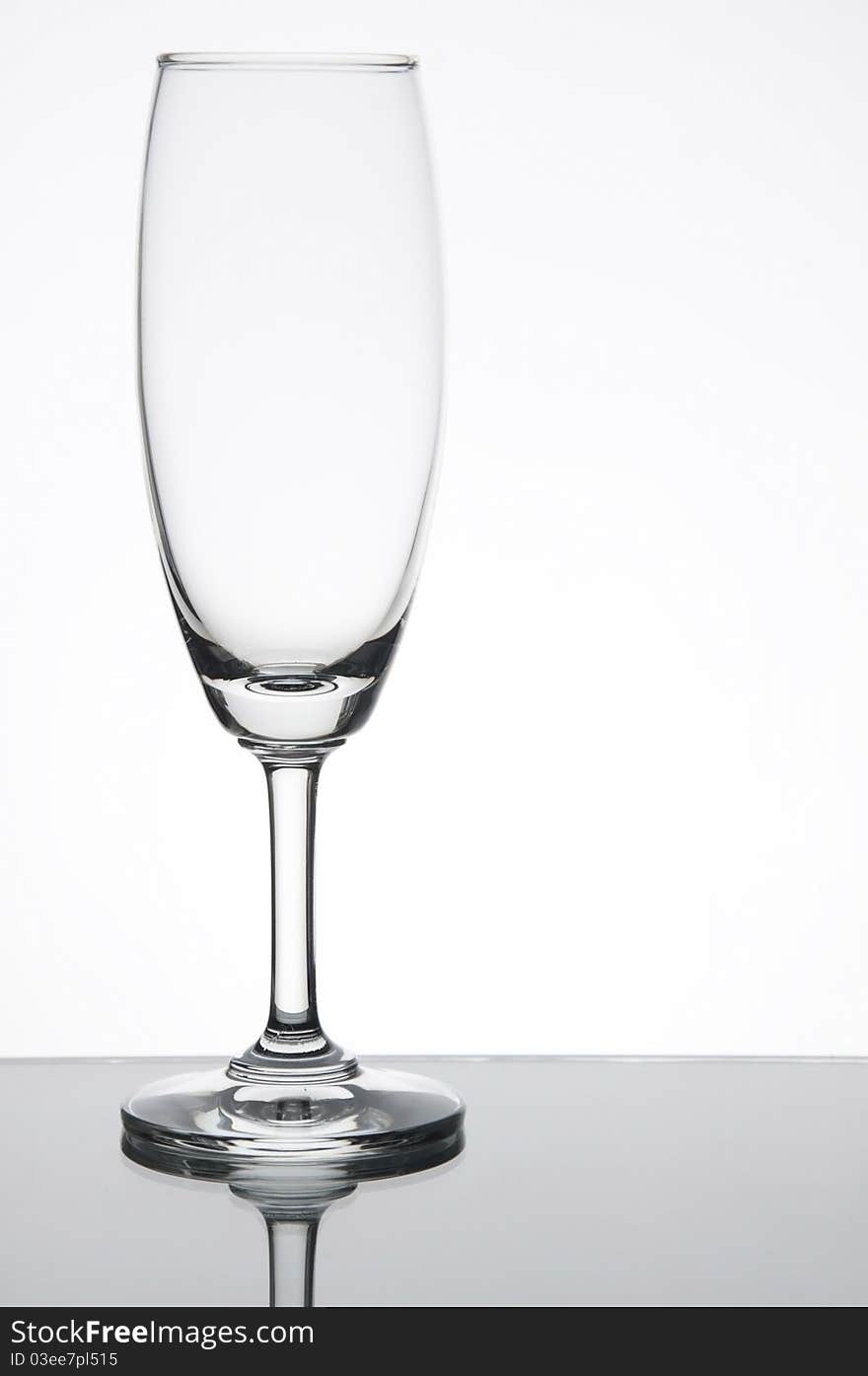 Empty champagne glass as white isoalte background