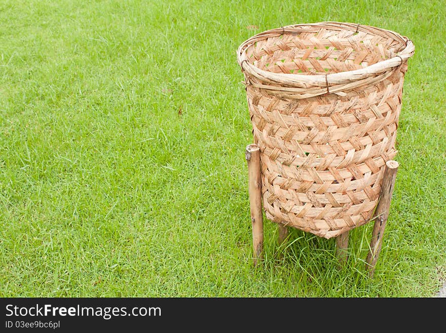 Basket for trash in the garden, Thailand. Basket for trash in the garden, Thailand