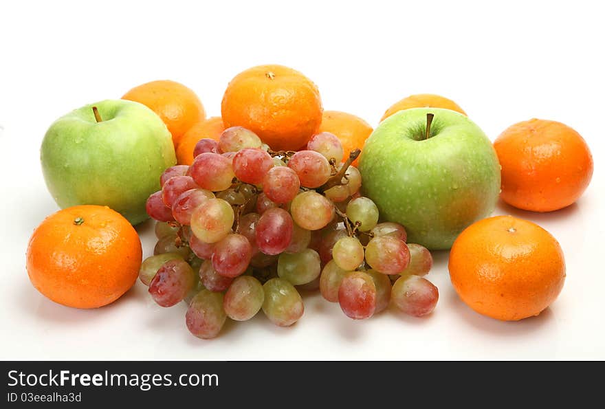 Ripe fruit on a white background