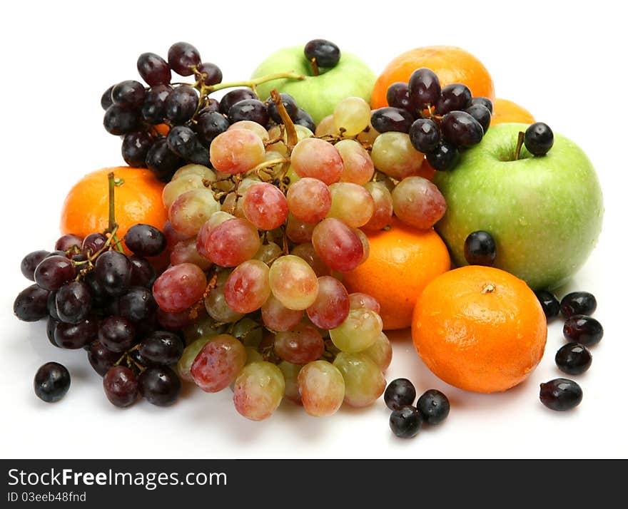 Ripe fruit on a white background