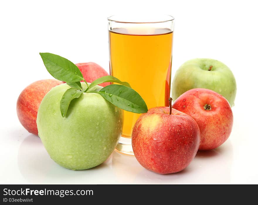 Ripe fruit and juice on a white background