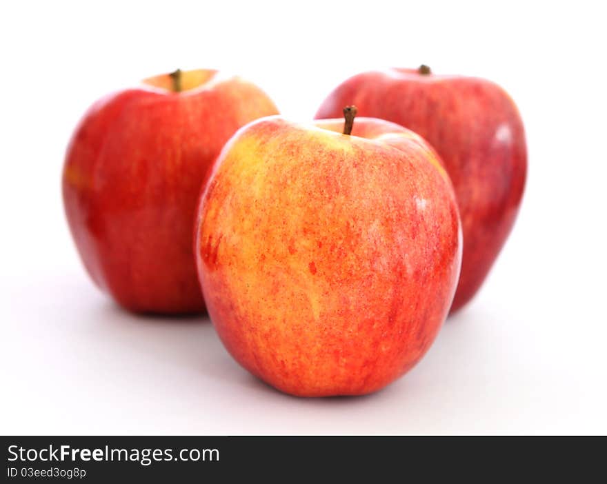 Three fresh apples on the white background. Three fresh apples on the white background