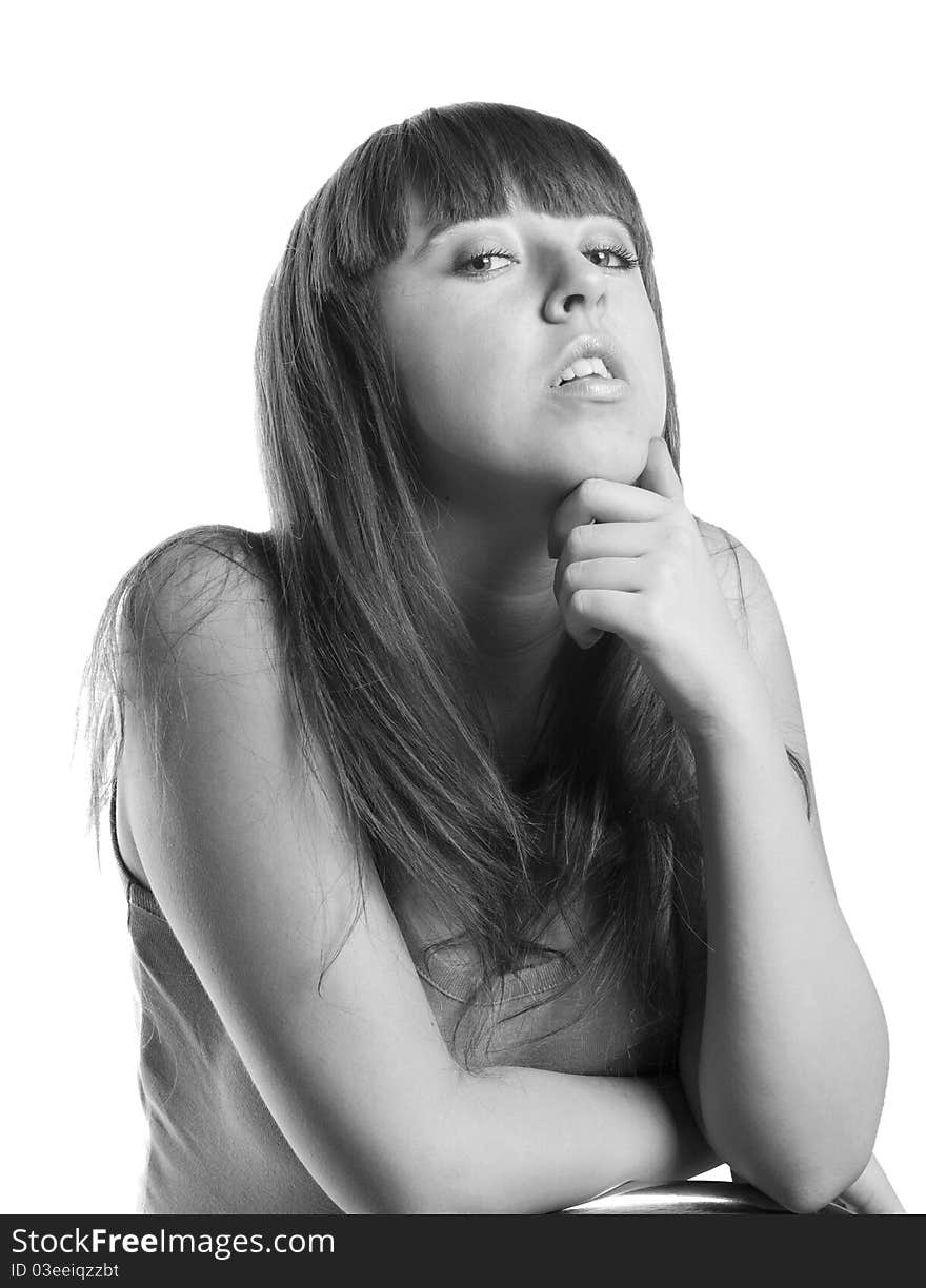 Black-and-white portrait of the thoughtful long-haired girl. Black-and-white portrait of the thoughtful long-haired girl