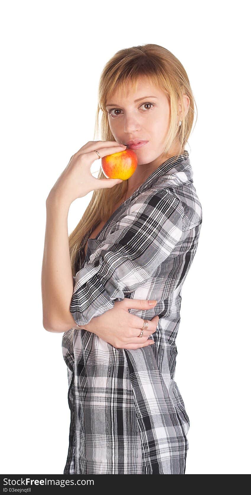 Portrait of the girl holding an apple in a hand on a white background. Portrait of the girl holding an apple in a hand on a white background