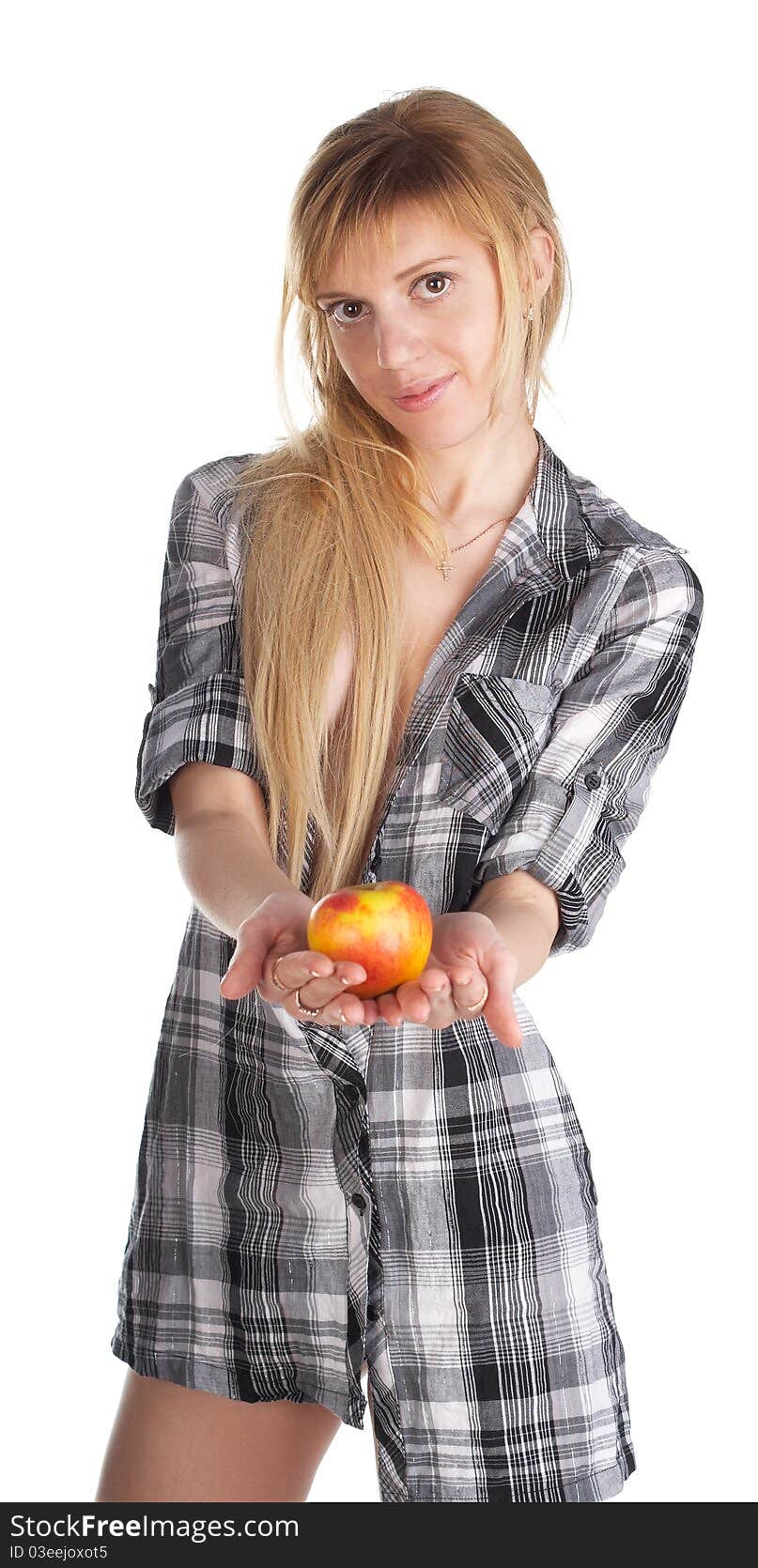 Portrait of the girl holding an apple in a hand on a white background. Portrait of the girl holding an apple in a hand on a white background