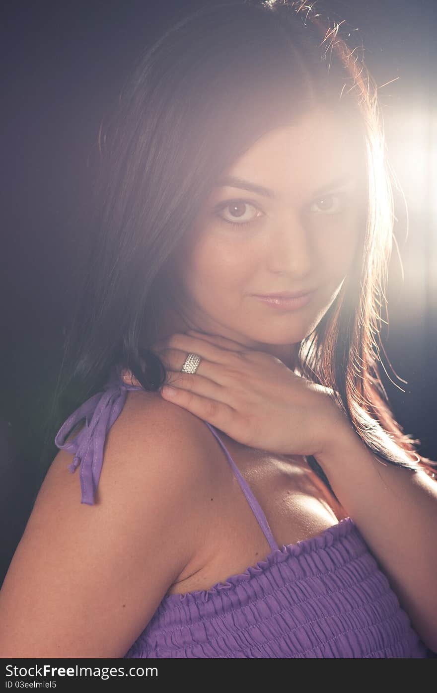 Portrait of romantic girl in lavender colour dress