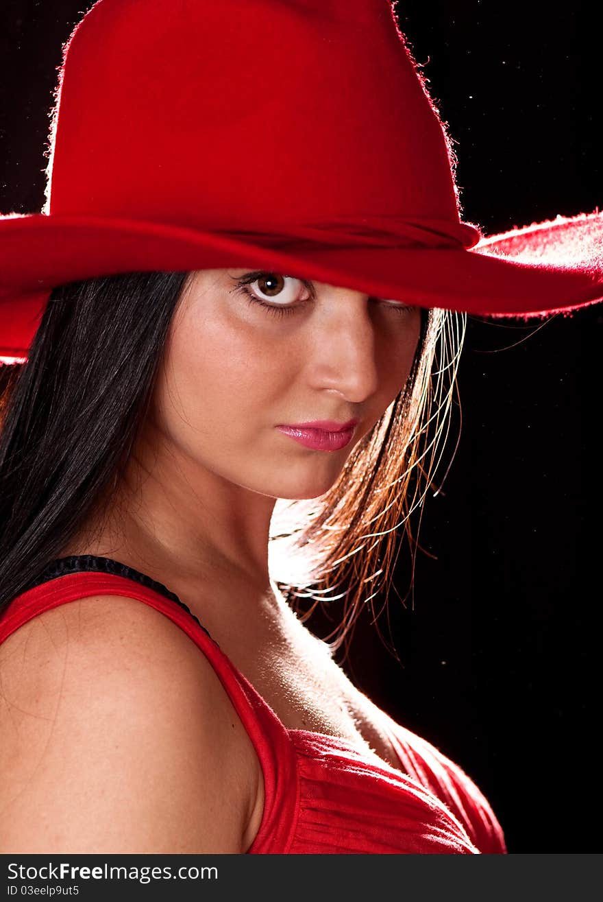 Sexy brunette wearing the red hat. Sexy brunette wearing the red hat