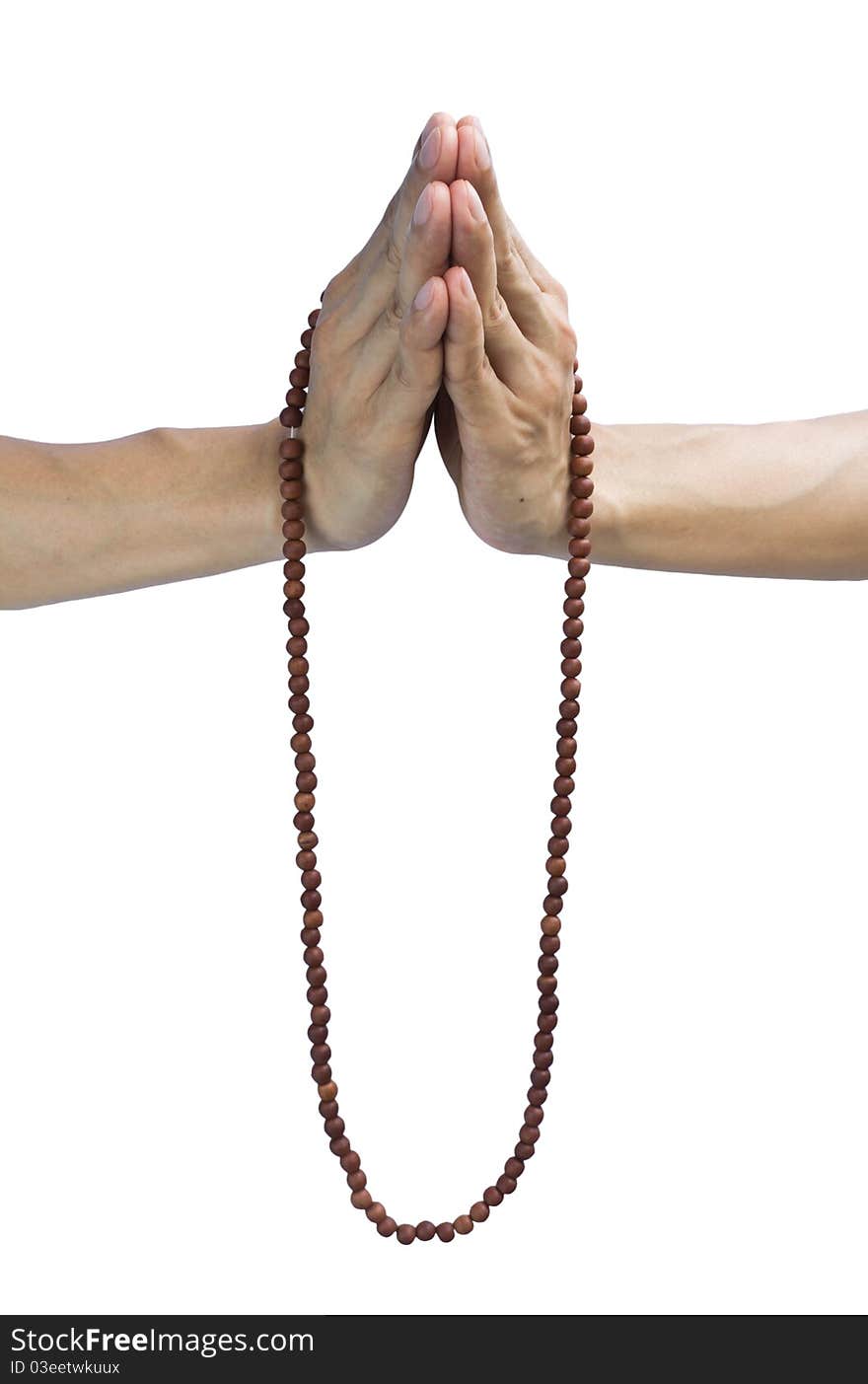 Hands holding beads necklace for prayer