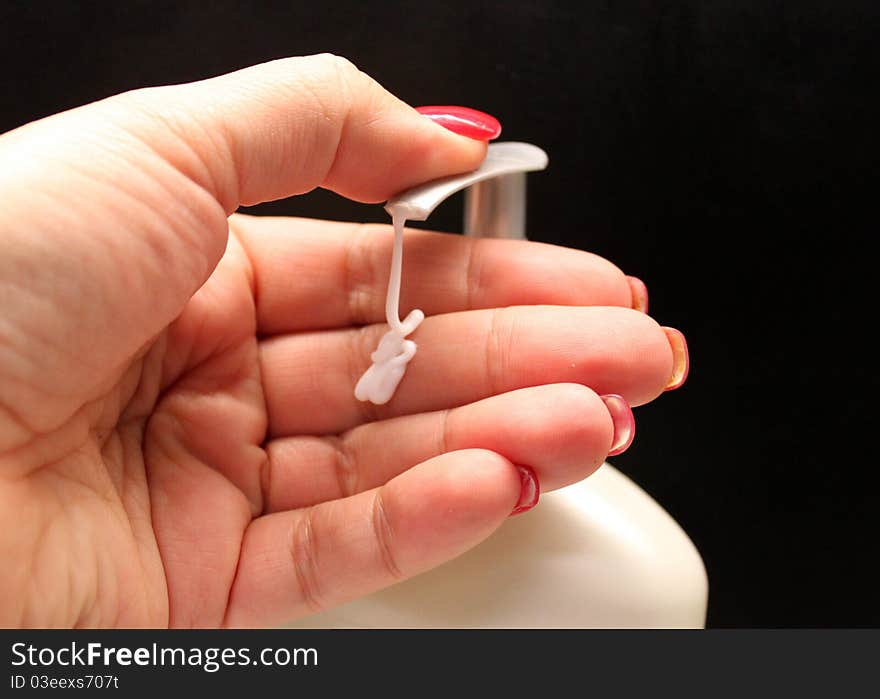 Woman s Hand with Lotion