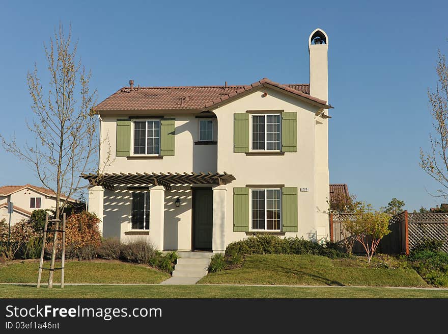 House Surrounded By Trees And Grass