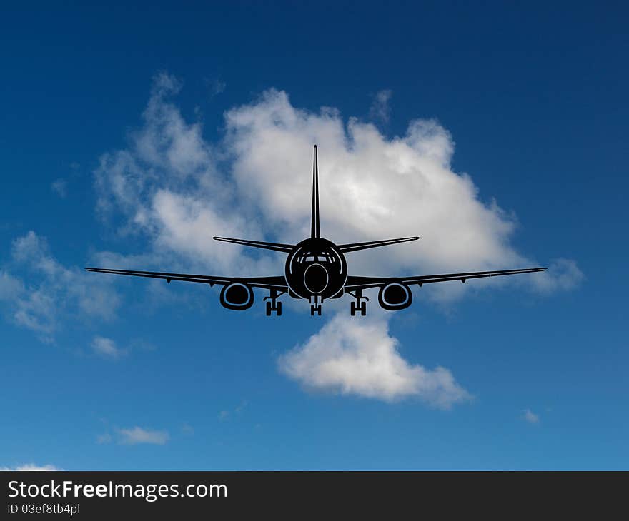 Aircraft silhouetted in a blue sky