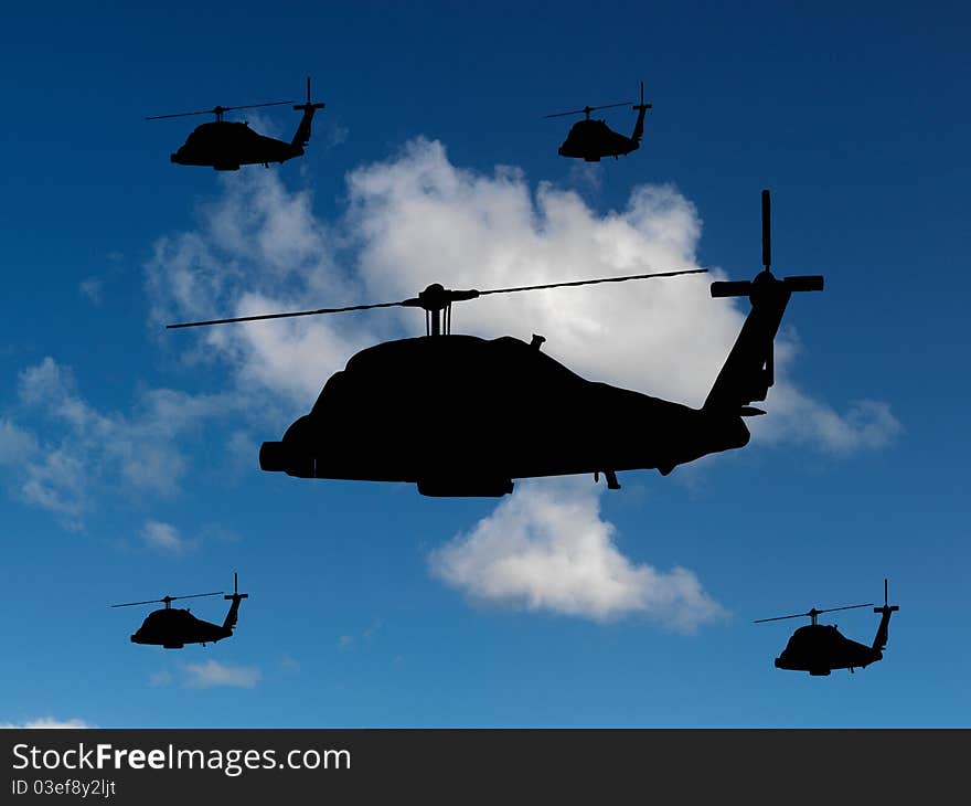 Helicopters silhouetted in a blue sky