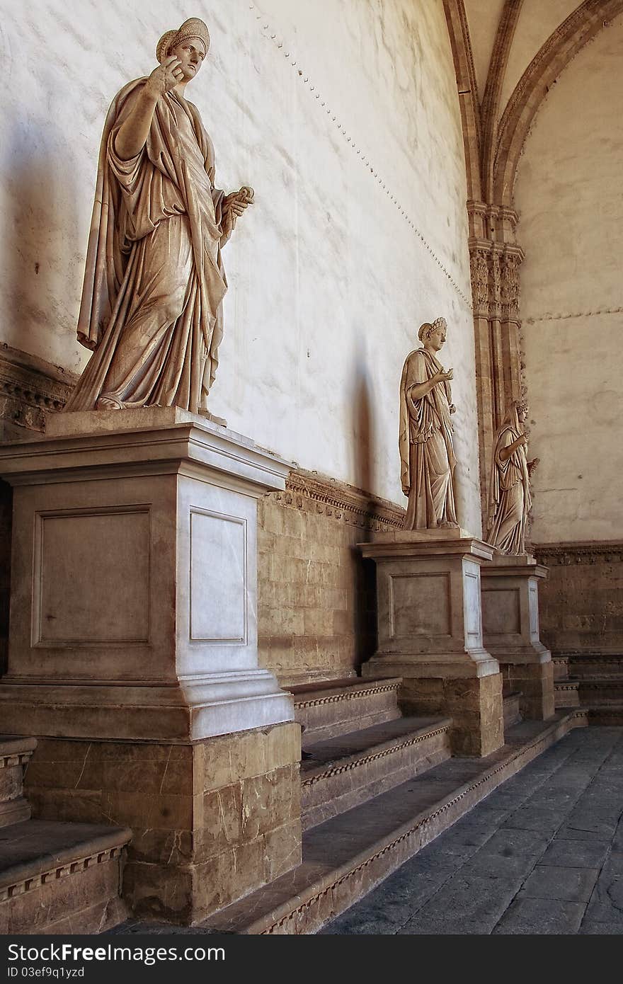 Roman Statues in the forum near Vecchio Tower, Florence, Italy