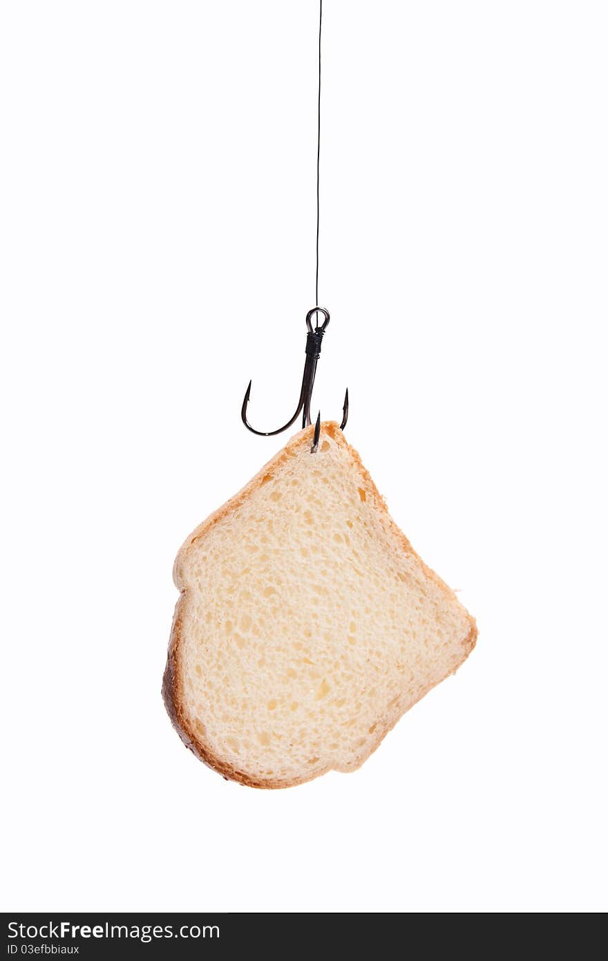 Piece of bread hanging on hook