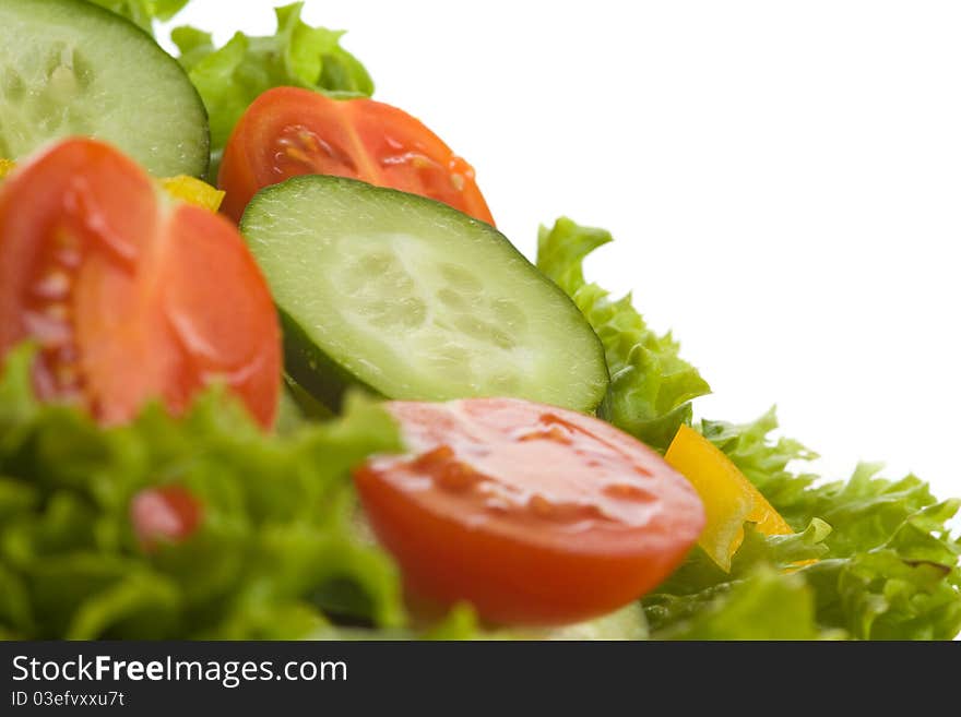 Healthy vegetables salad over white. Healthy vegetables salad over white