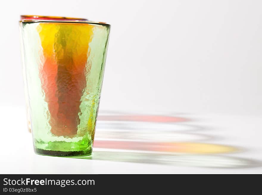 Six colorful murano glasses with reflection