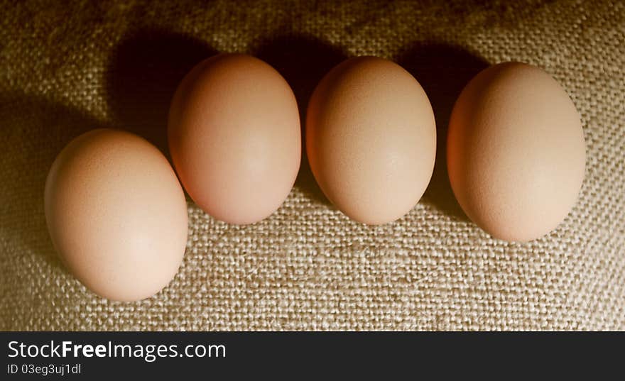 Four brown eggs.