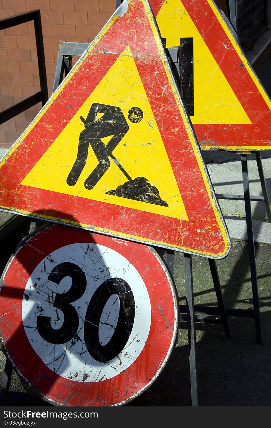 Road signs for men at work