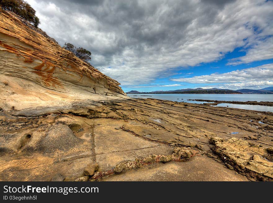 Natural sandstone formations on the beach in Tasmania. Natural sandstone formations on the beach in Tasmania.