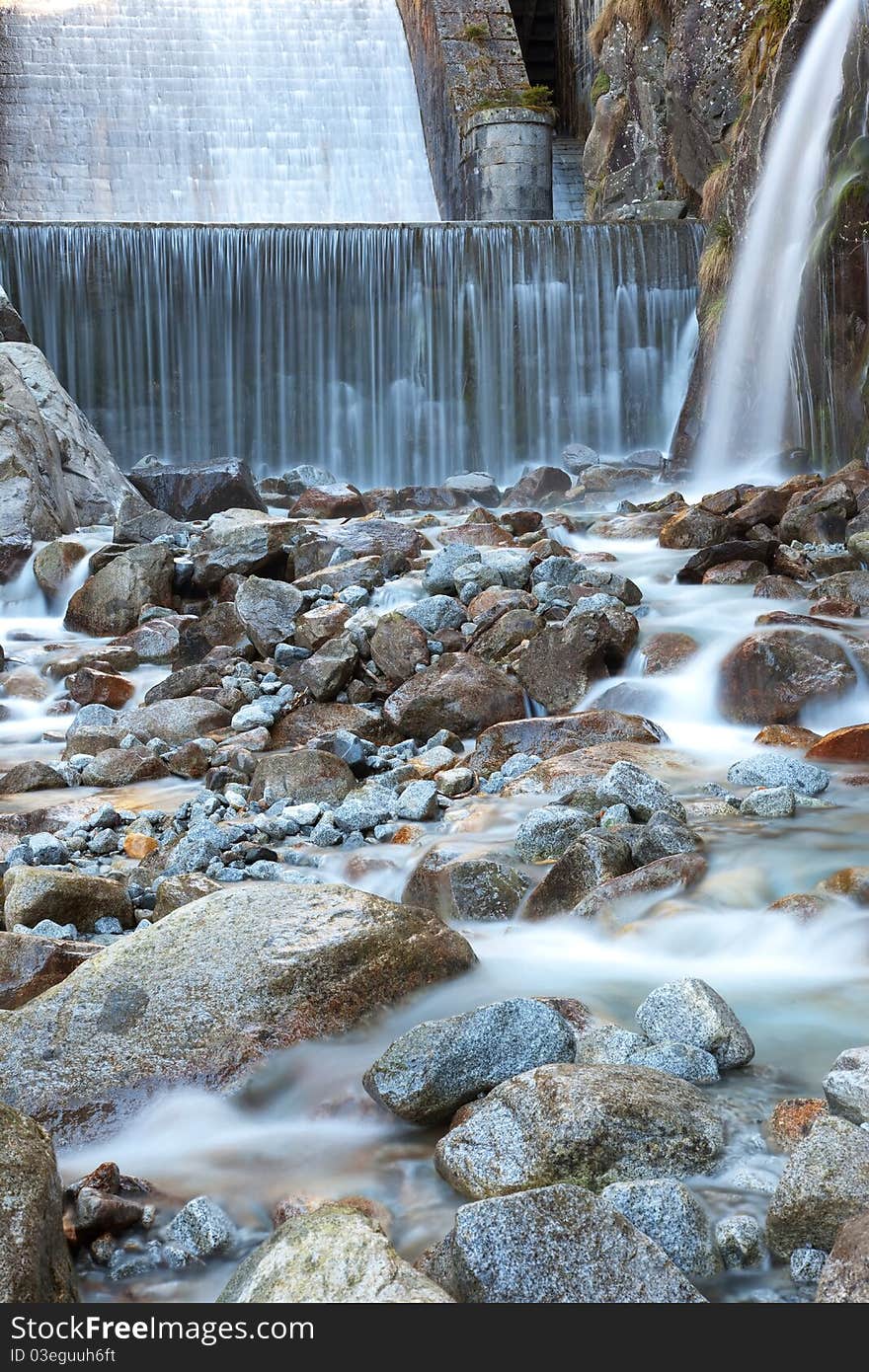 Cimbergo’s falls, created by the artificial lake of an hydroelectric power station, Brixia province, Lombardy region, Italy.