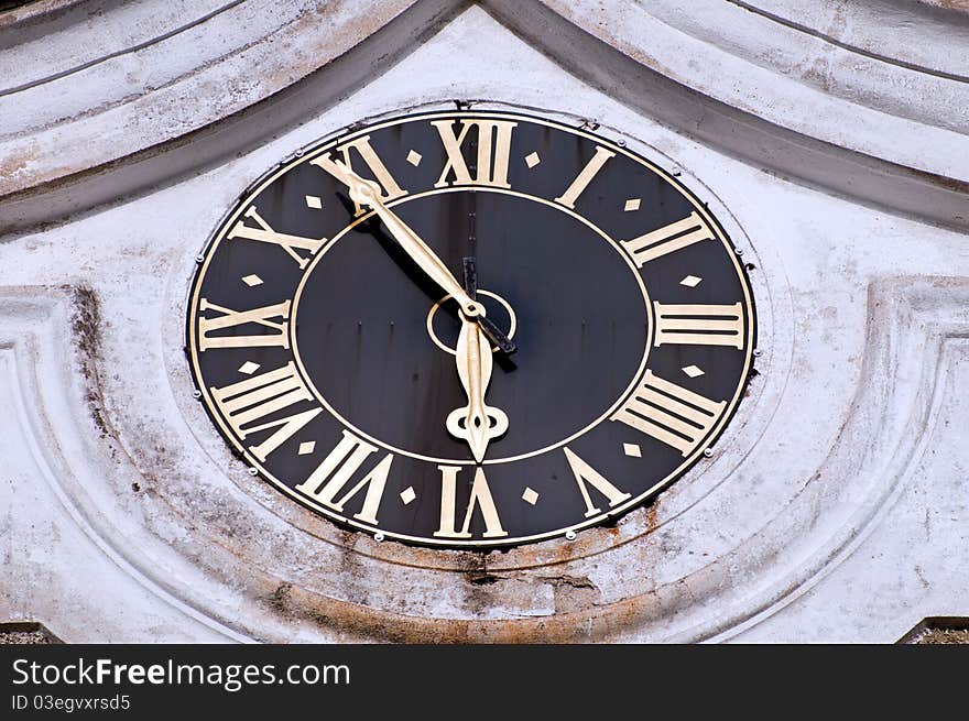 Detail of medieval clock on the outside of the churchl in Broumov, Czech Republic. Detail of medieval clock on the outside of the churchl in Broumov, Czech Republic.