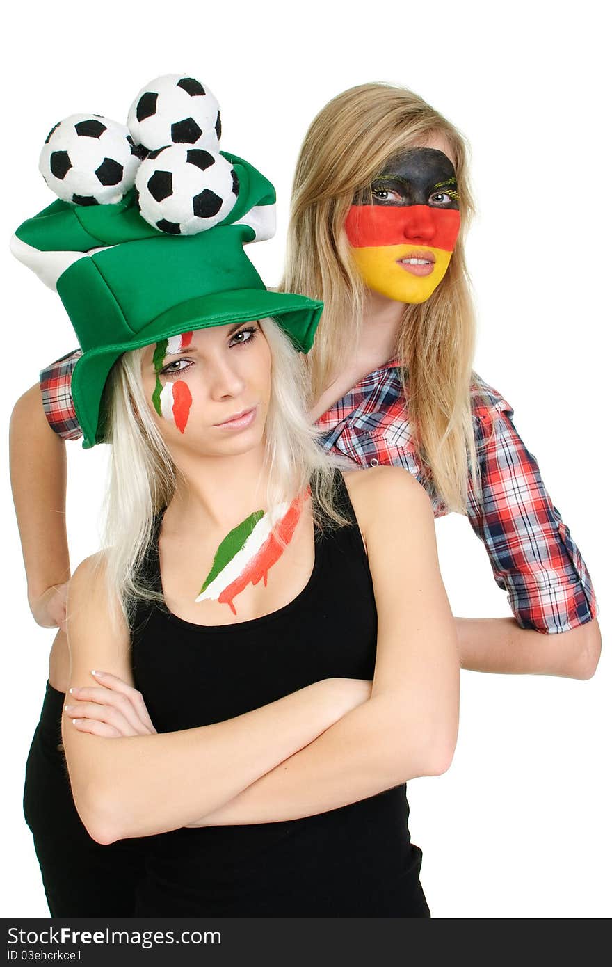 Two sports fans with painted faces