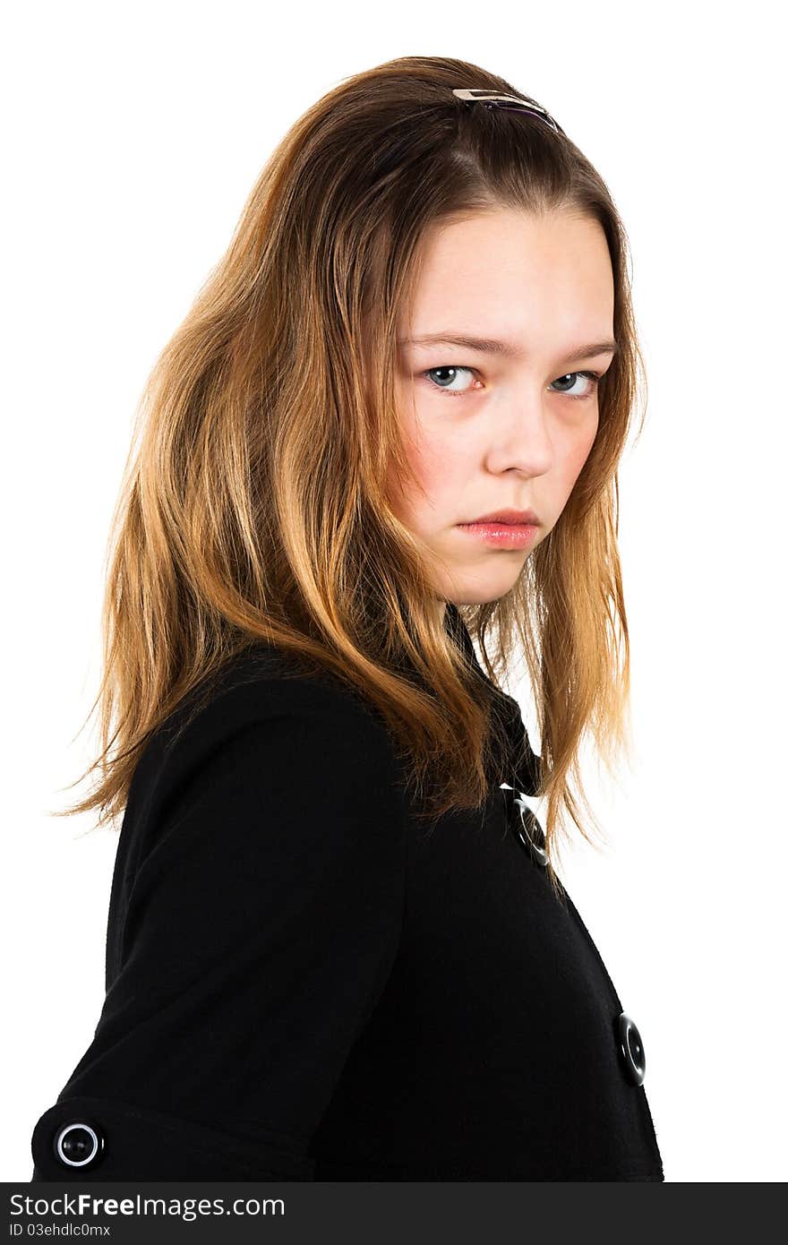 Girl in a black coat over a white background