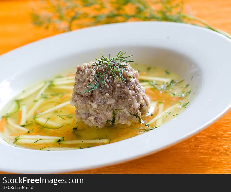 Soup with meatball and  vegetables