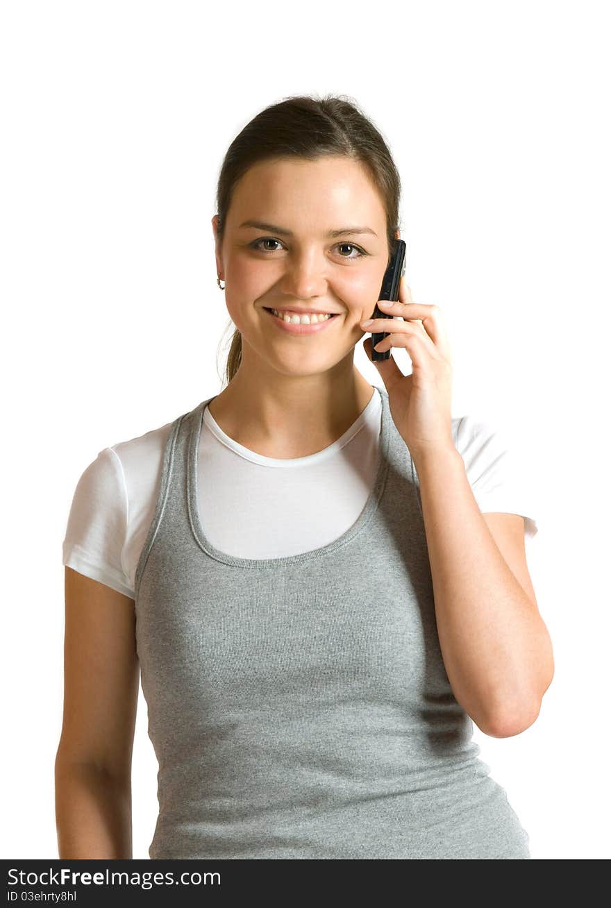 Girl talking on a mobile phone, isolated