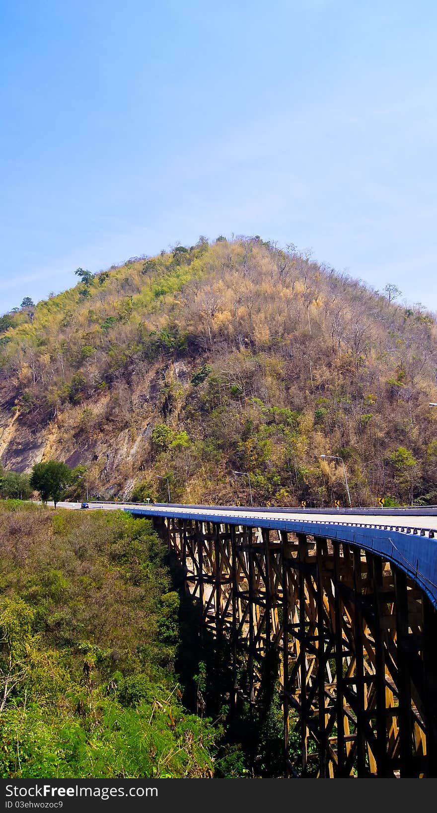 Bridge pass over valley in sunshine