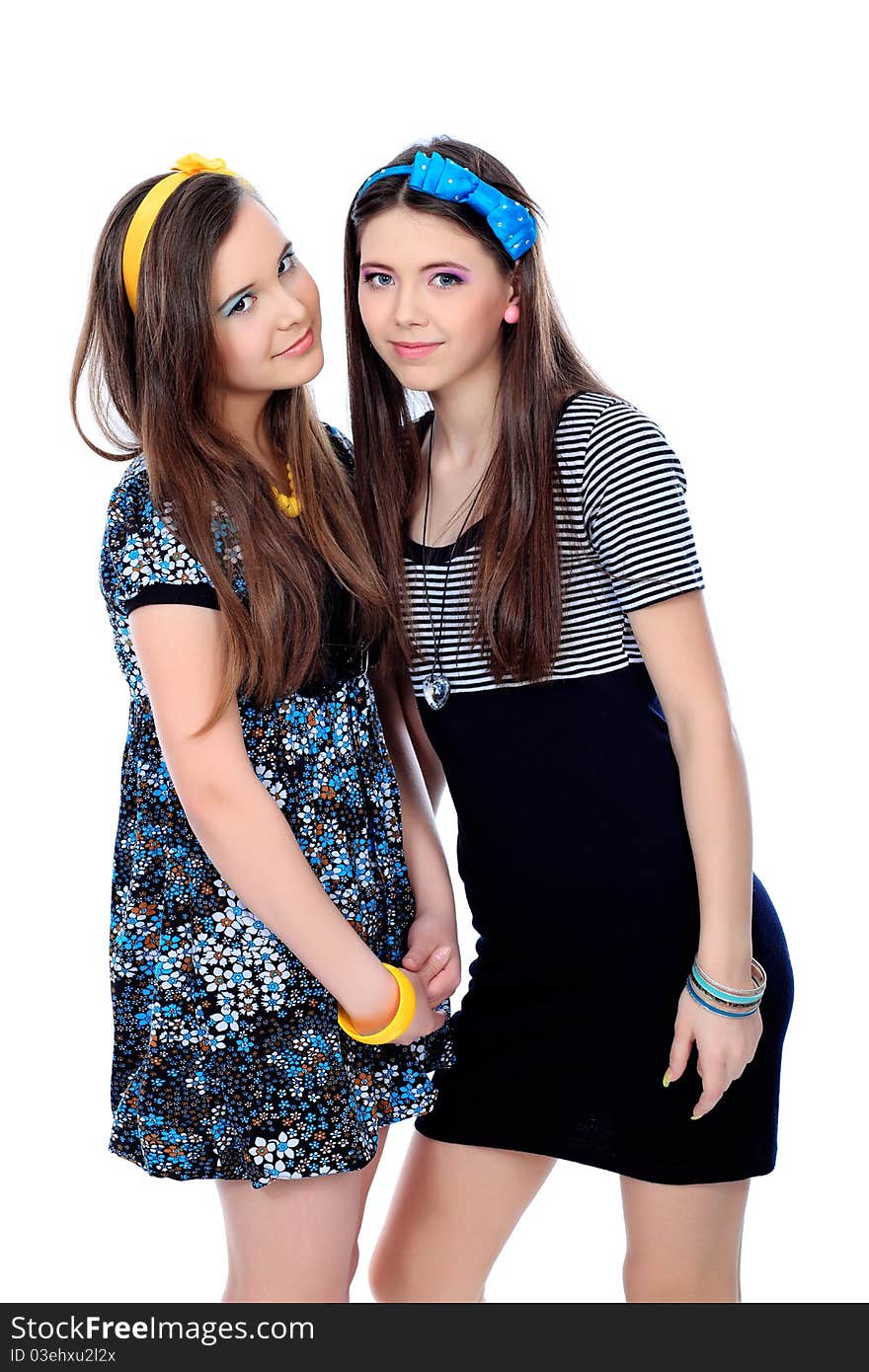 Two happy girls friends. Isolated over white background. Two happy girls friends. Isolated over white background.