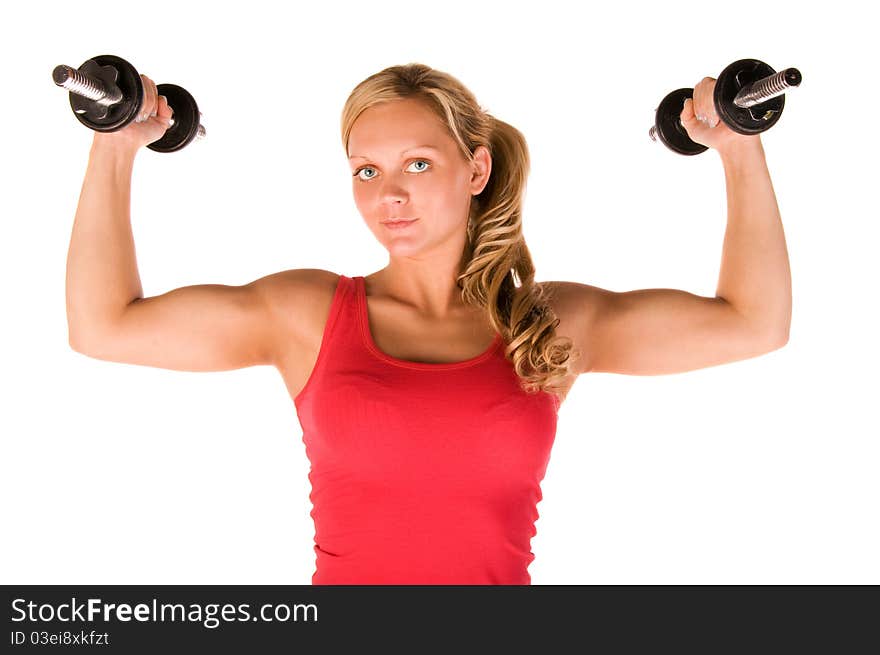 Young beautiful woman in the gym