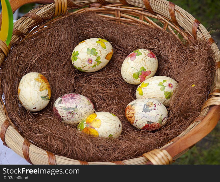 View colored easter eggs in the basket