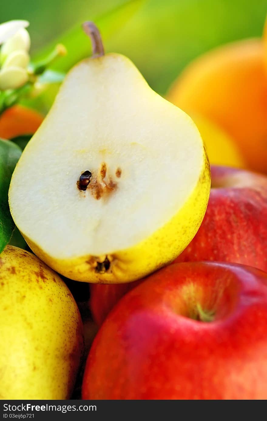 Slice of Rocha pear and fruits.