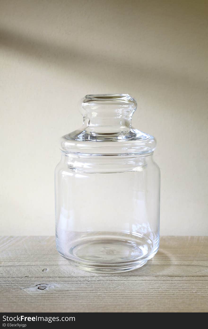 Old glass bottle on a wooden table