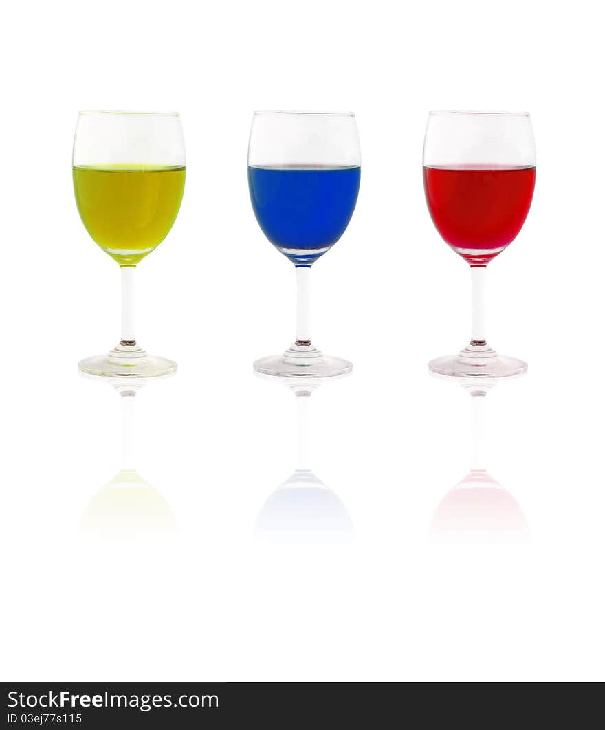 Glass of colorful liquid cut out on white background