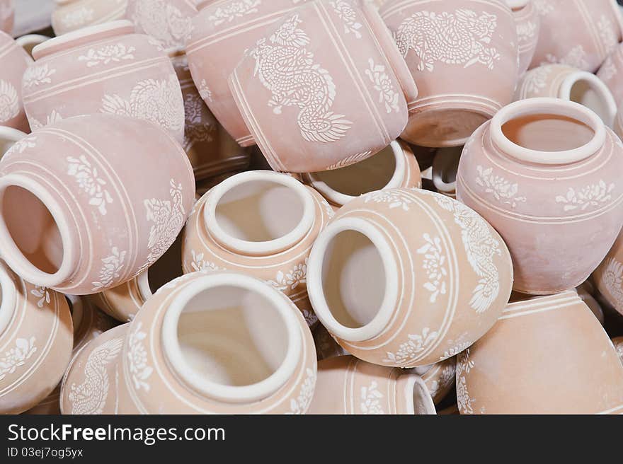 A pile of earthenware jars. A pile of earthenware jars.