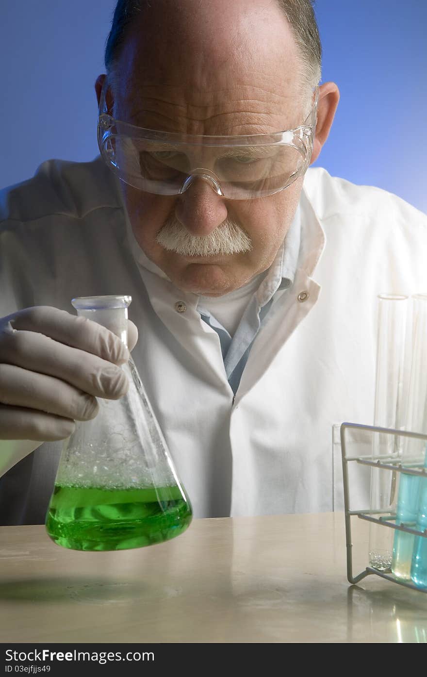 Chemist working with chemicals