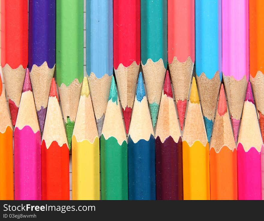 Colored pencils lying close to each other