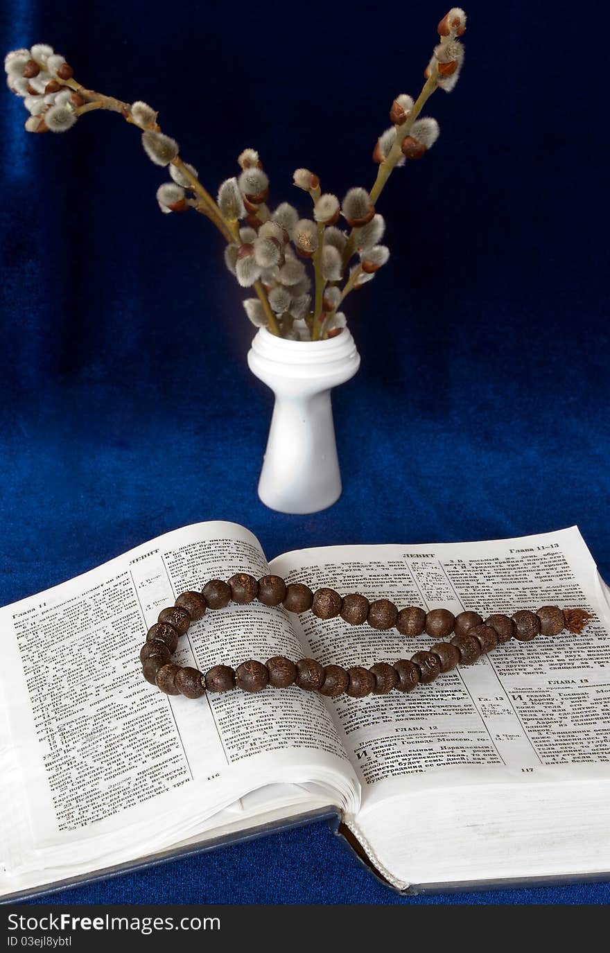 The bible, candle and branch willow. The bible, candle and branch willow