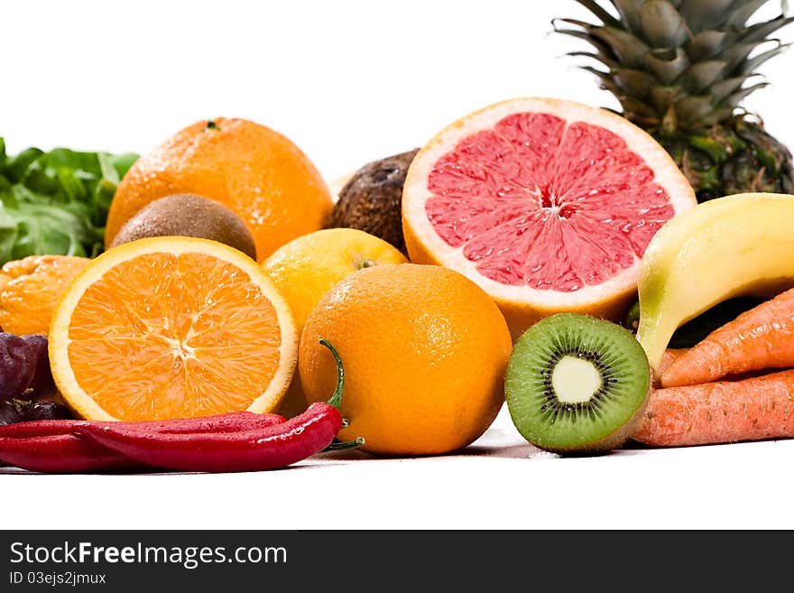 Full frame photograph of a broad variety of fruits and vegetables; colorful and plentiful