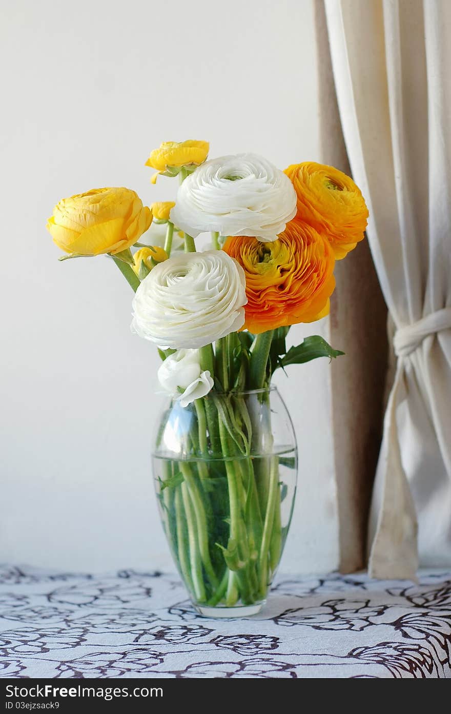 Bouquet of pretty orange and white ranunculus. Bouquet of pretty orange and white ranunculus