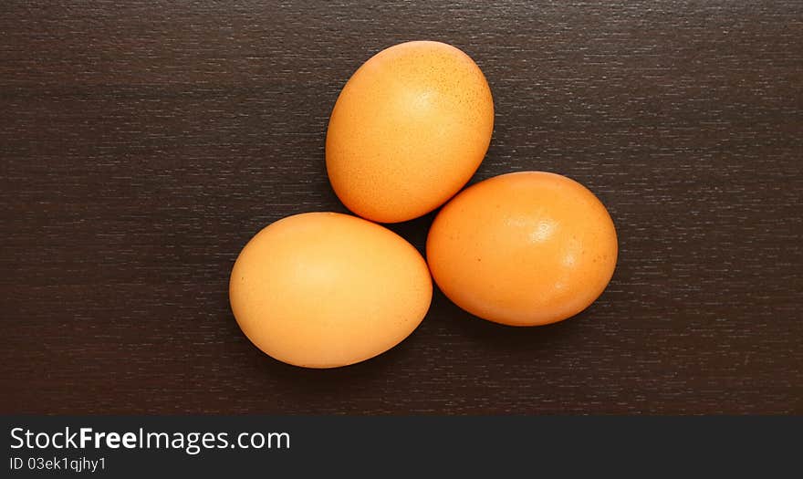 Egg On Brown Wood Texture