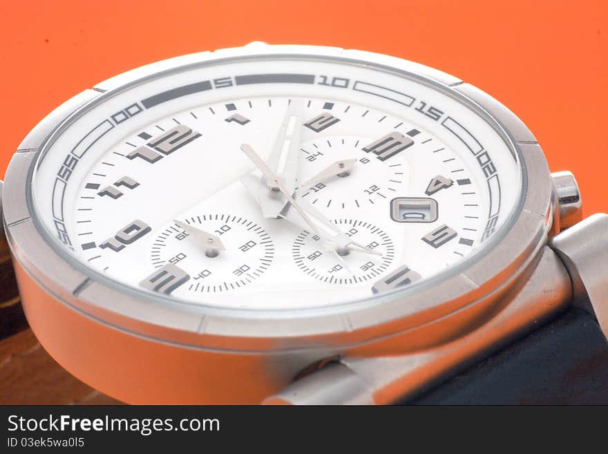 Beautiful Man Watch With Orange Background